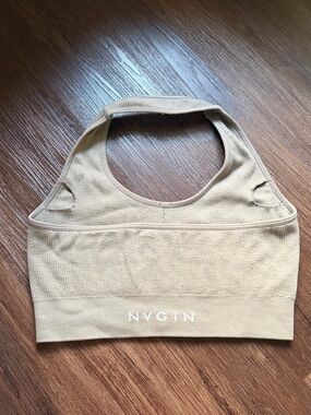 NVGTN cream halter top sports bra